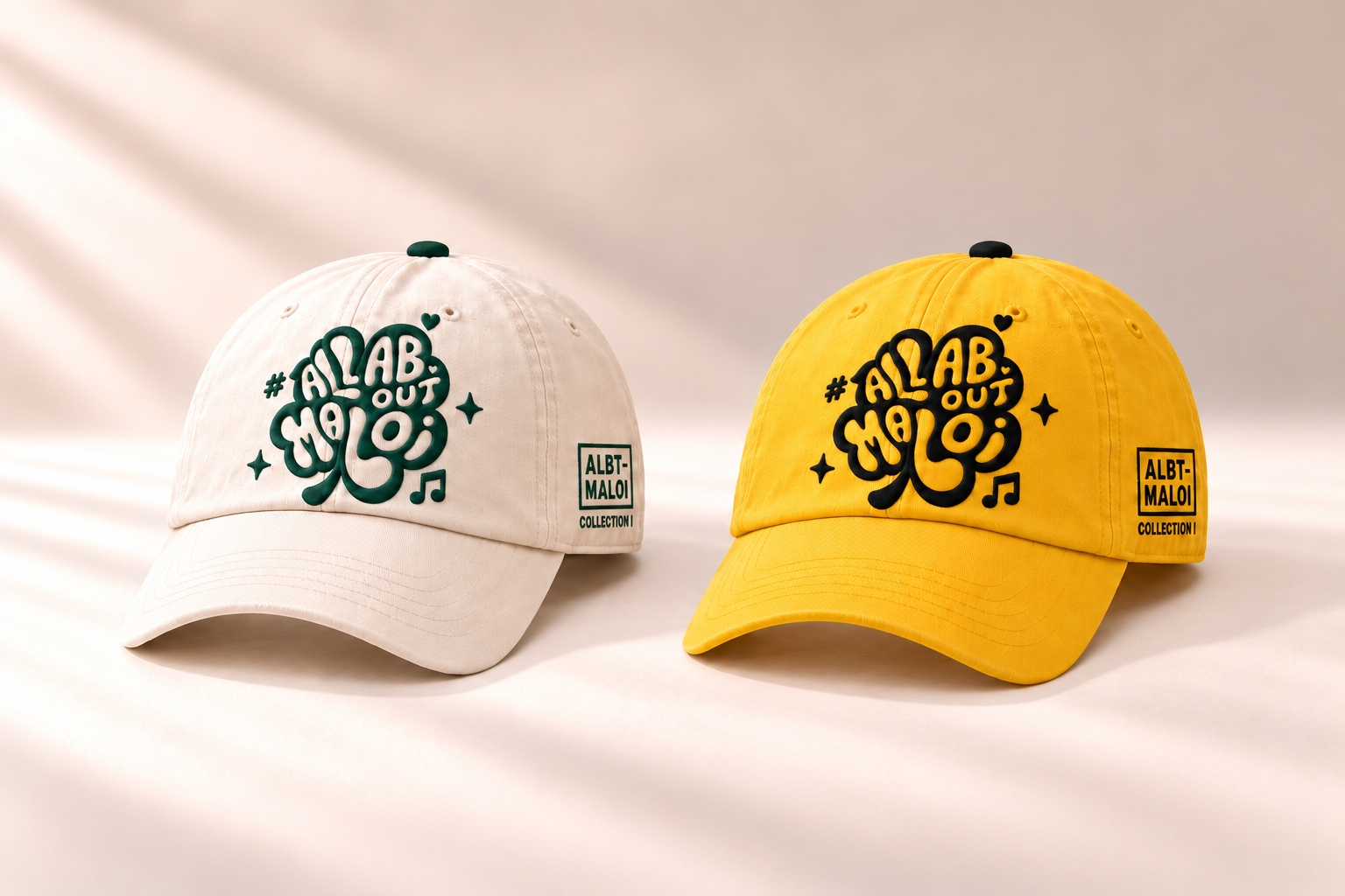 Cap design concepts: cream/off-white with dark green embroidery and yellow with black embroidery.